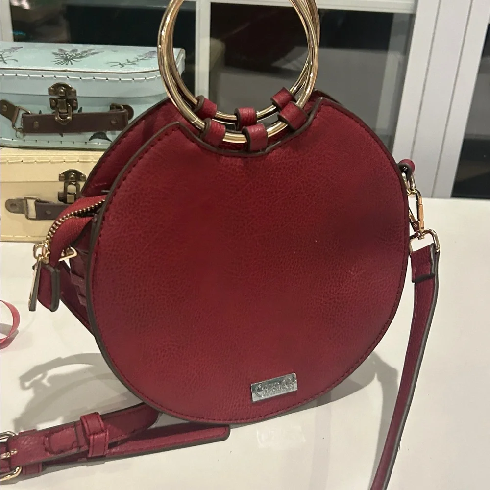 Carlos Santana faux pebbled leather maroon western crossbody bag laser cut rings